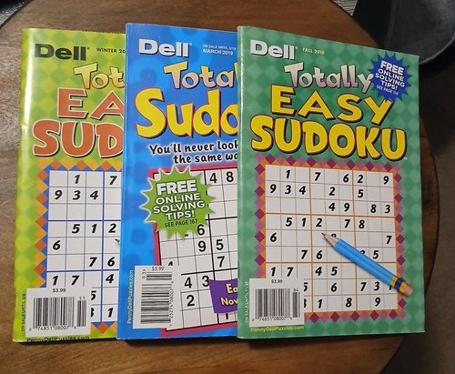 Dell totally Easy Sudoku! 2 Books Of Puzzles! And 1 Totally Sudoku!3 Lots Of Fun