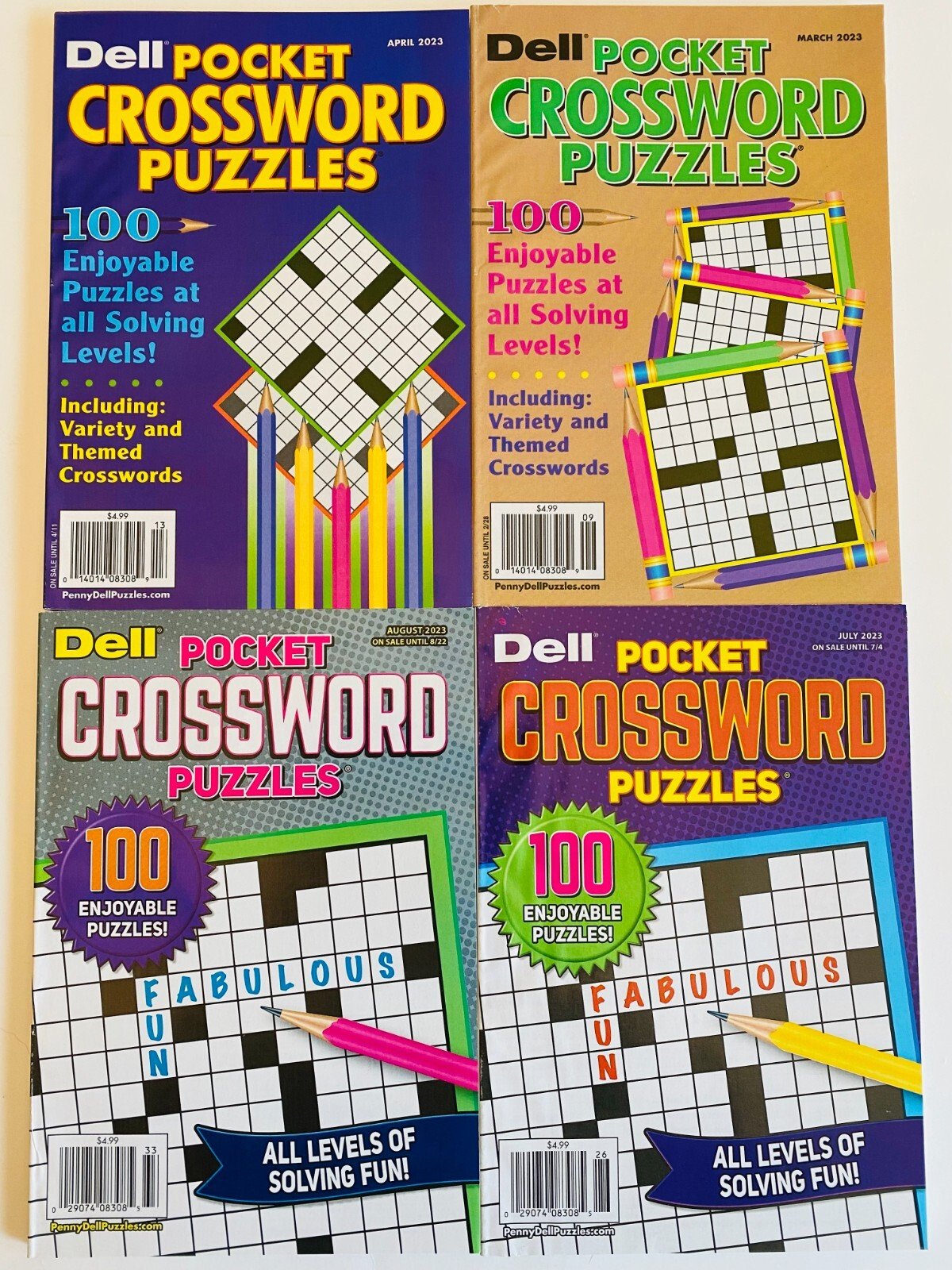Lot of 4 Penny Press Dell Pocket Crossword Puzzles Themed Variety 2023