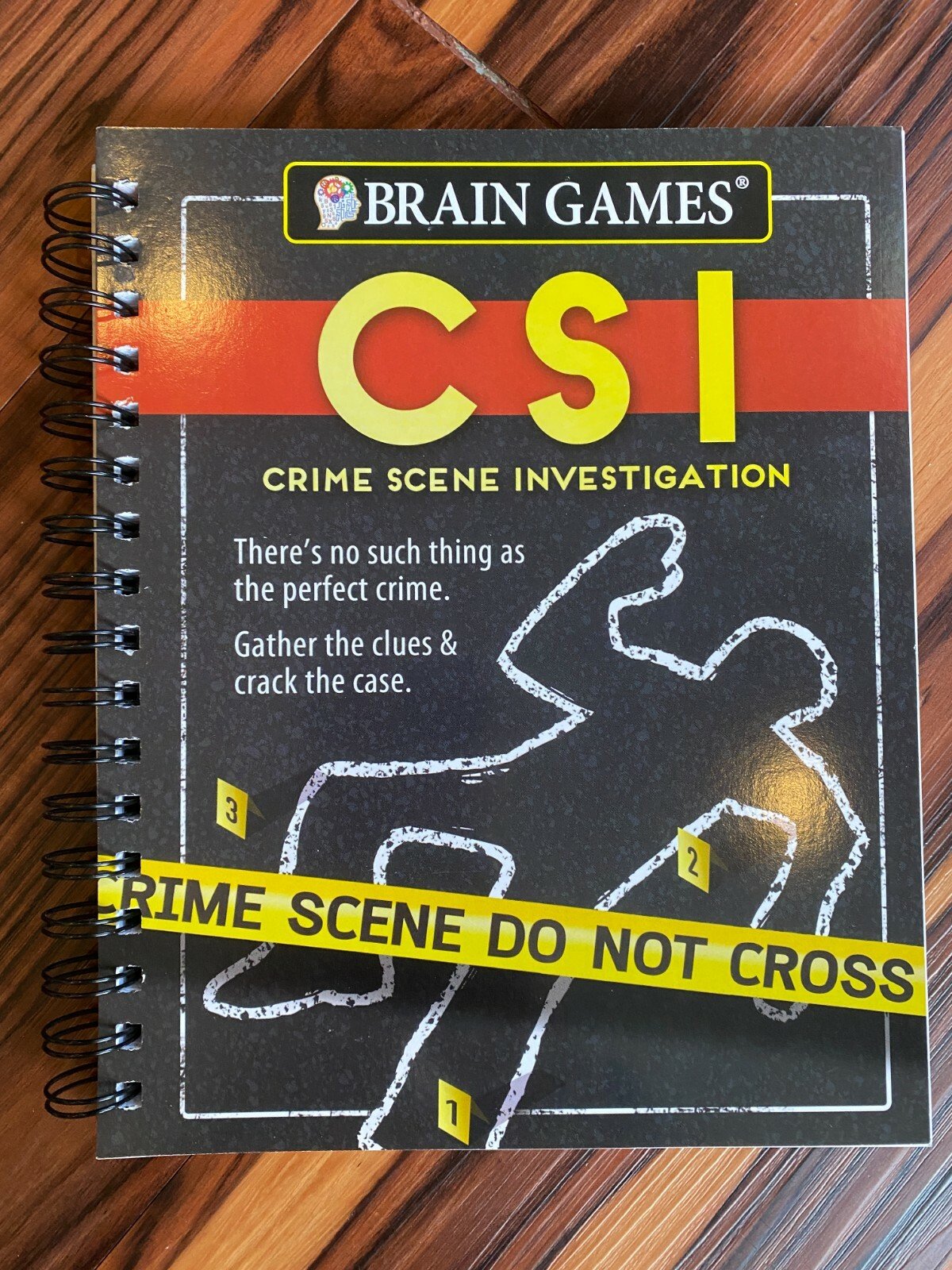 Brain Games – CSI – Various Puzzles and Games, Spiral Bound, New