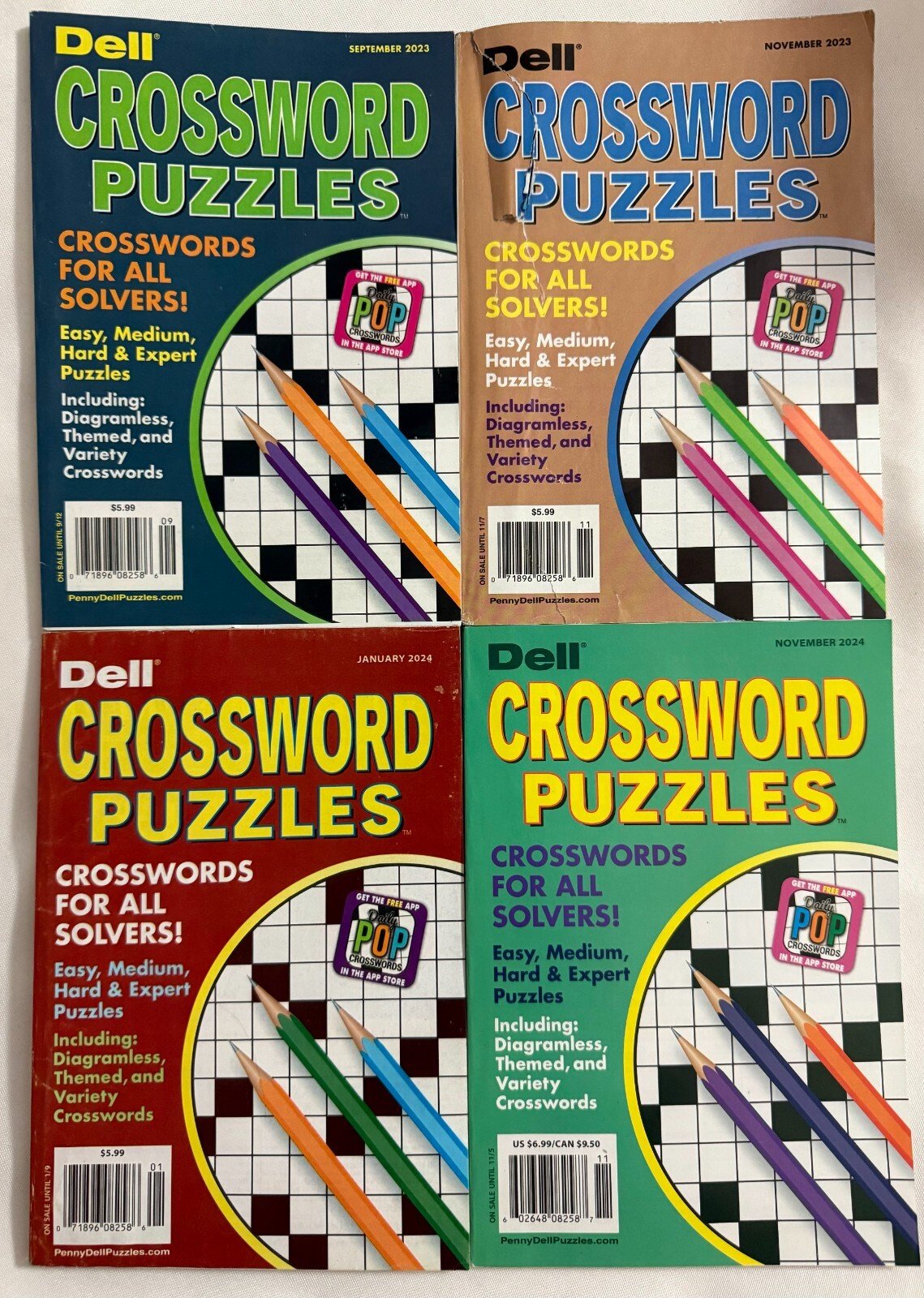 Lot (4) Dell Crossword Puzzles Puzzle Books (2023 Sept,Nov & 2024 Jan,Nov)